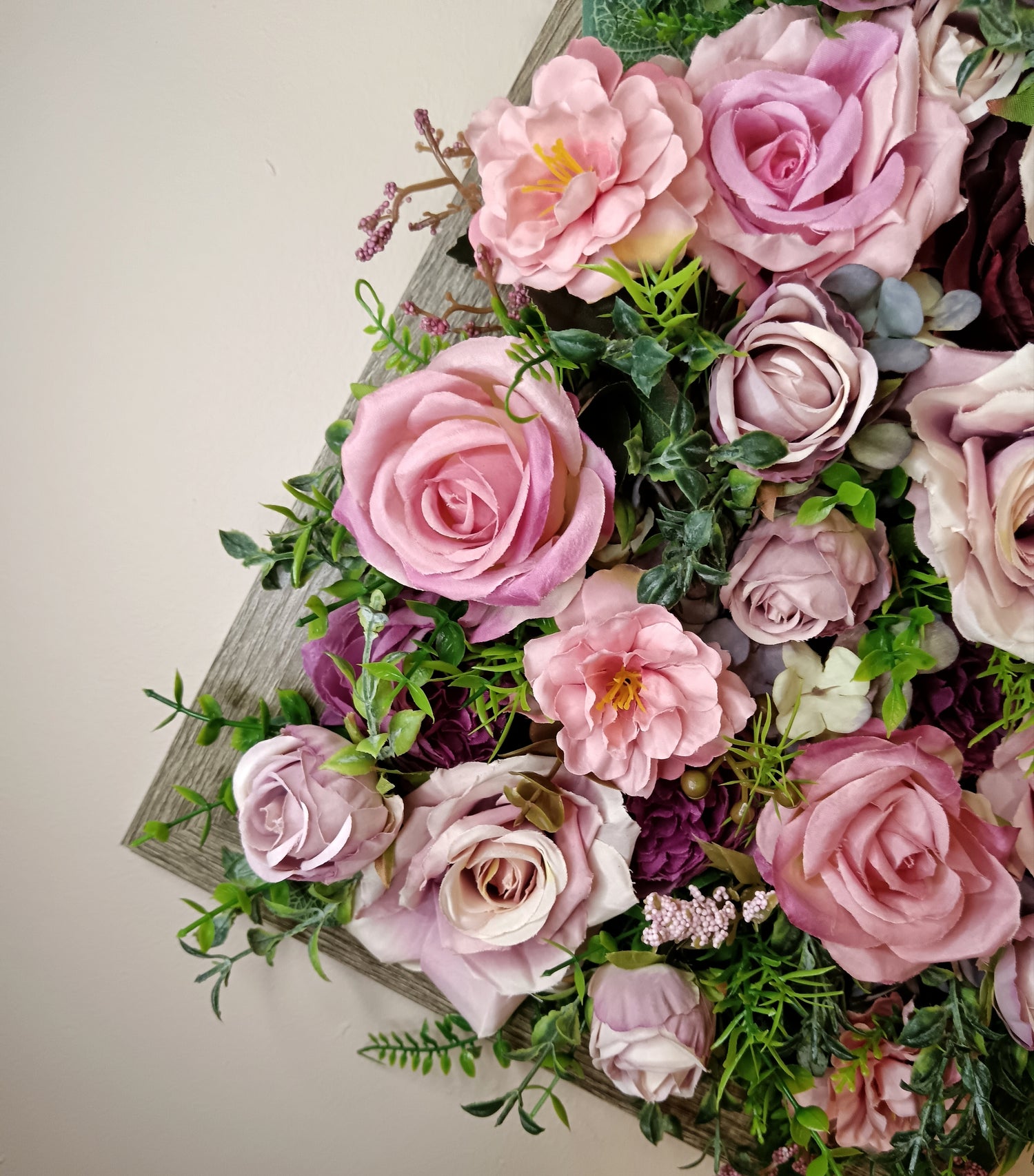 Artificial flower arrangements in a FRAMES