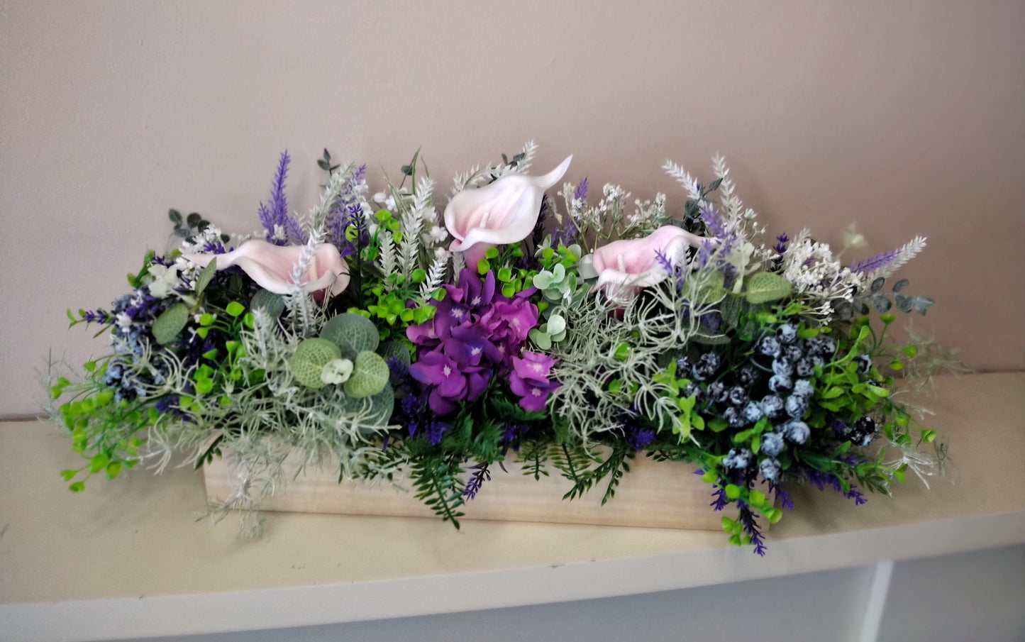 Artificial flowers in a wooden box G