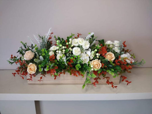 Artificial flowers in a wooden box J