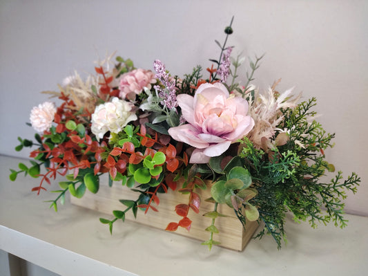 Artificial flowers in a wooden box K