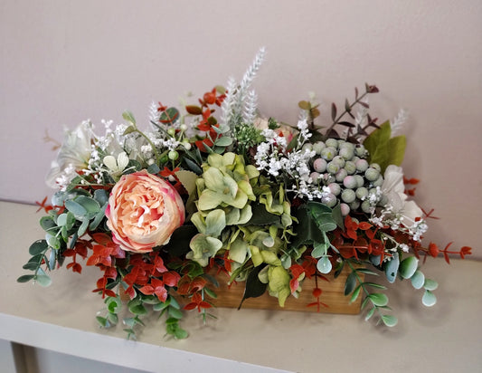 Artificial flowers in a wooden box L