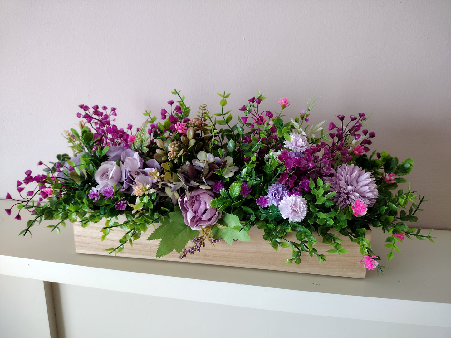 Artificial flowers in a wooden box M