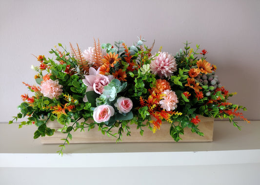 Artificial flowers in a wooden box N