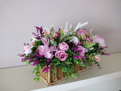 Artificial flowers in a woven basket S