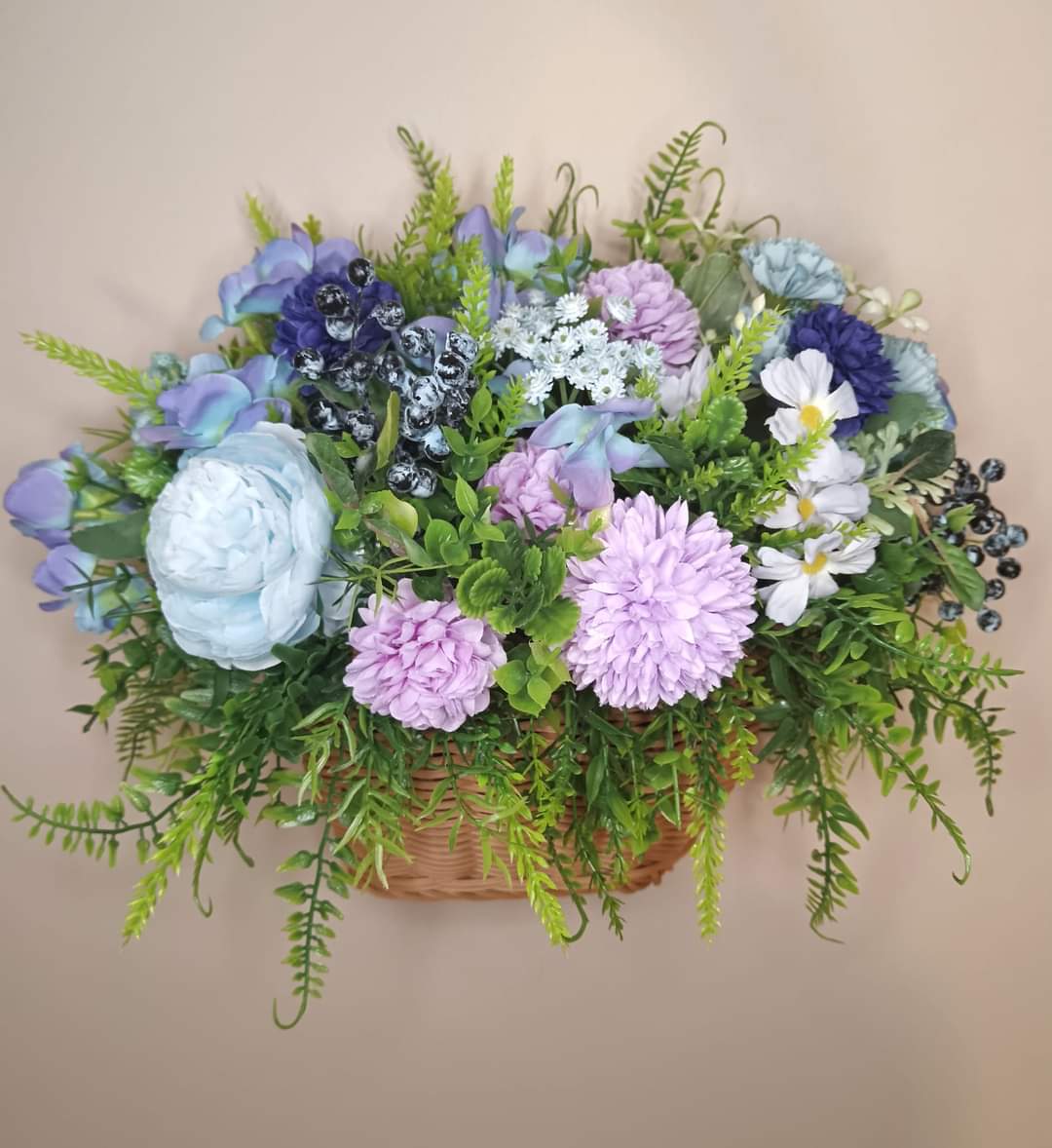 Artificial flowers in a basket W