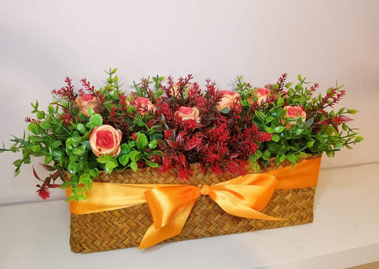 Artificial flowers in woven basket Z